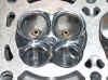 4x ampo guides aready installed,  and the first stages of chamber shaping & cc`ing, seat wk & mill wk lg.JPG (57199 bytes)